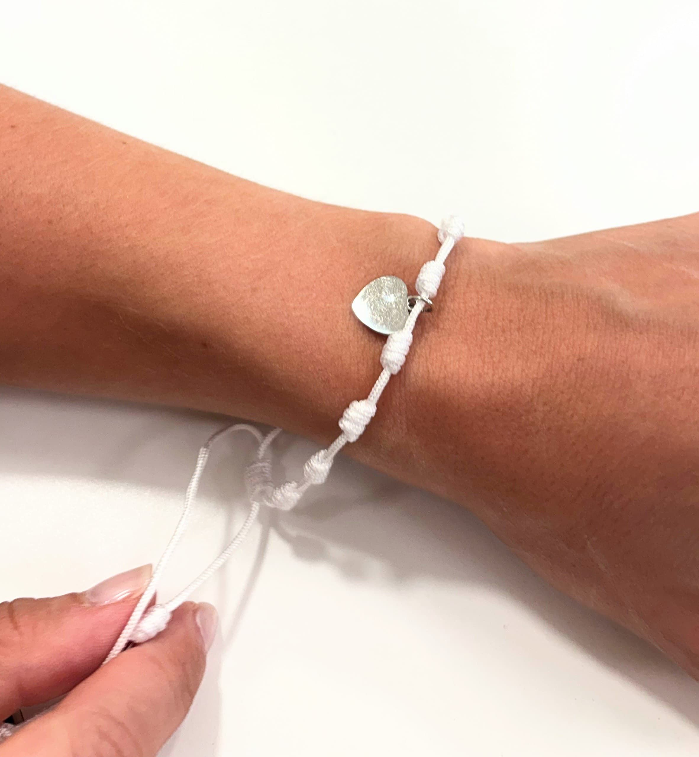 Pulsera 7 nudos blanca